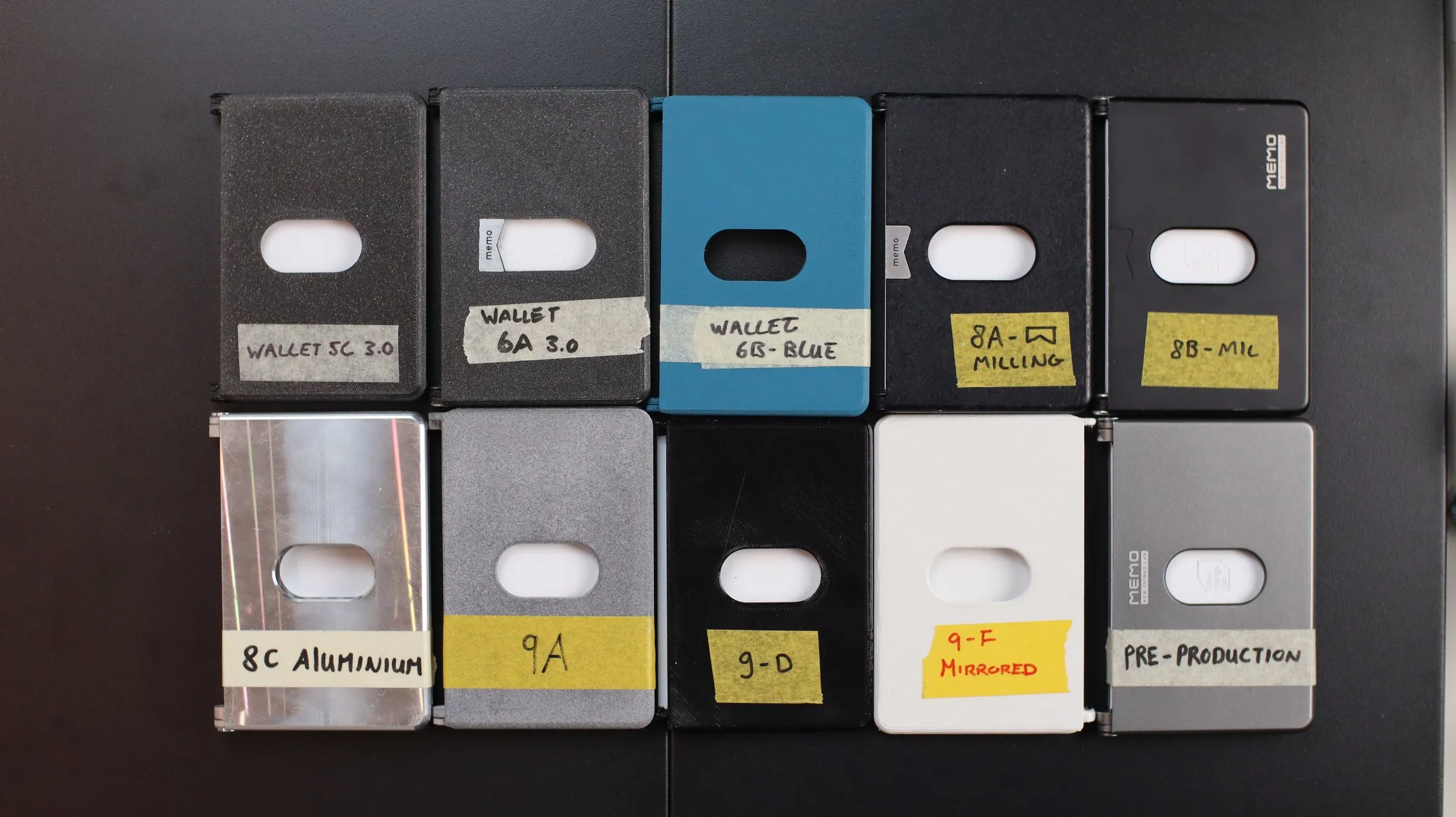 Ten labelled iterations side by side, from Wallet 5C to the pre-production sample