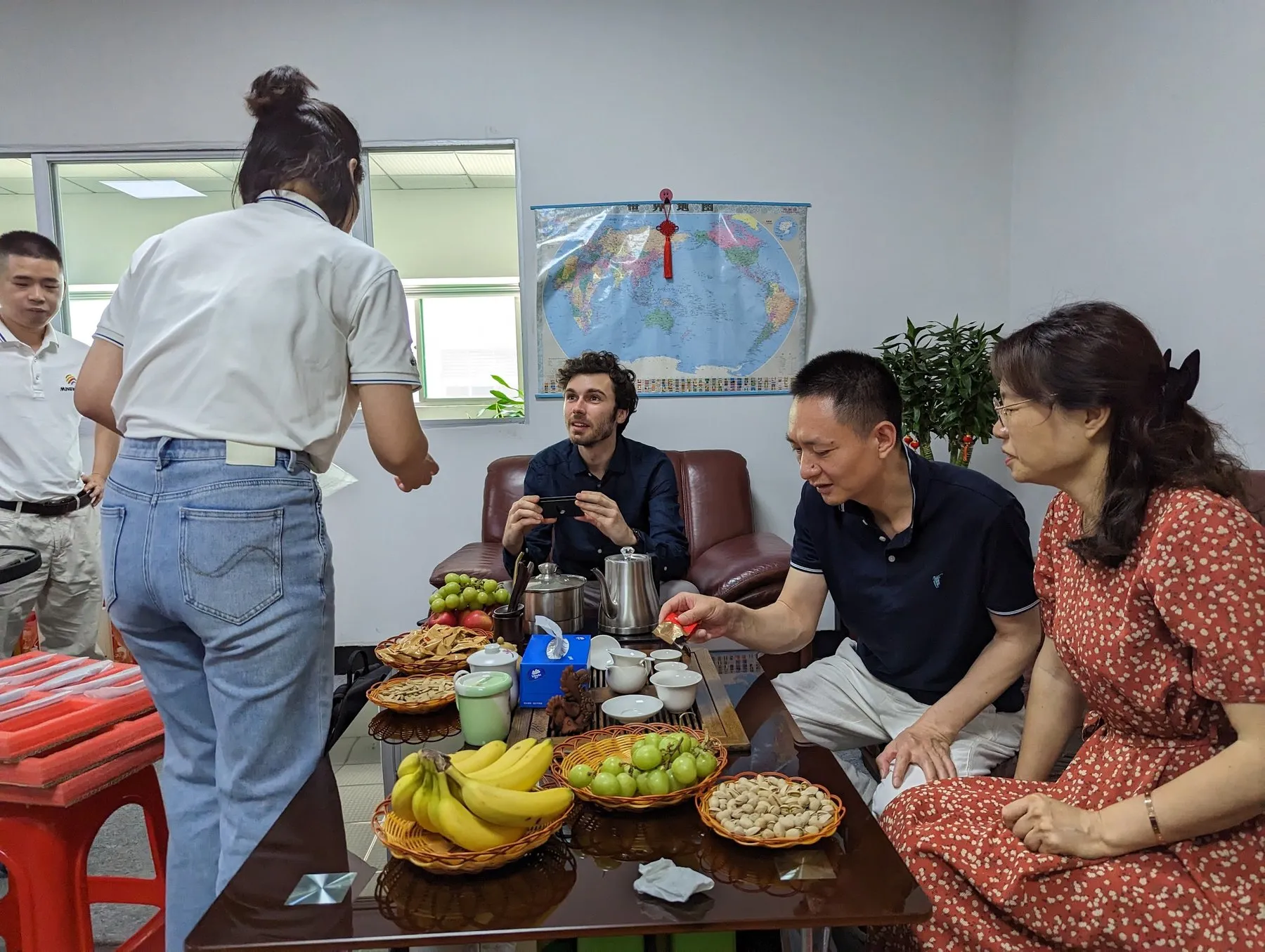 Tea with a supplier in their office