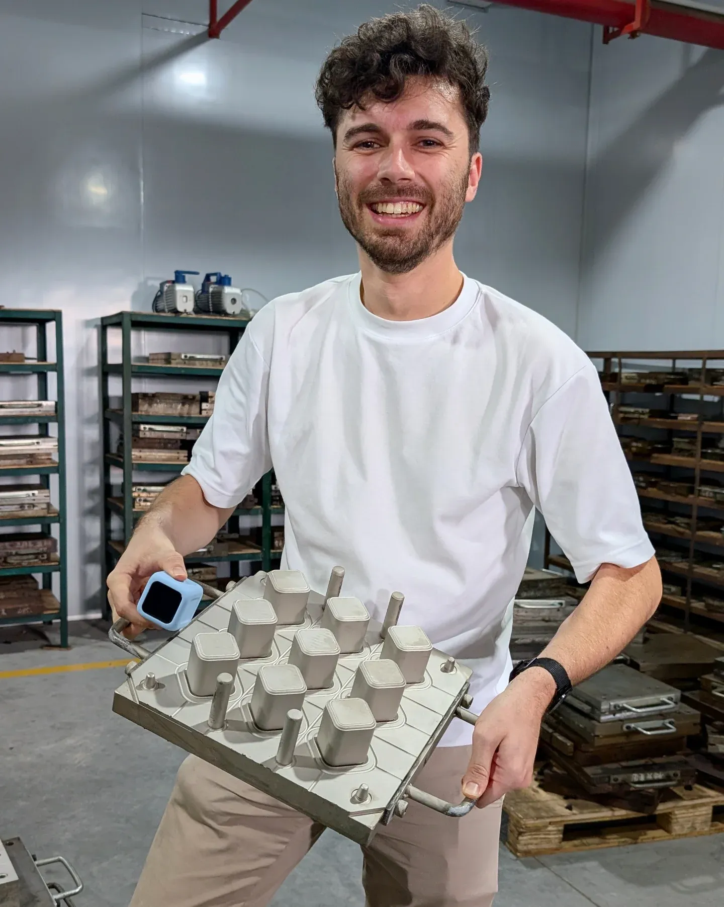 Nyckle in the factory, holding the production mould for the silicone cover of the ZONE Productivity Timer