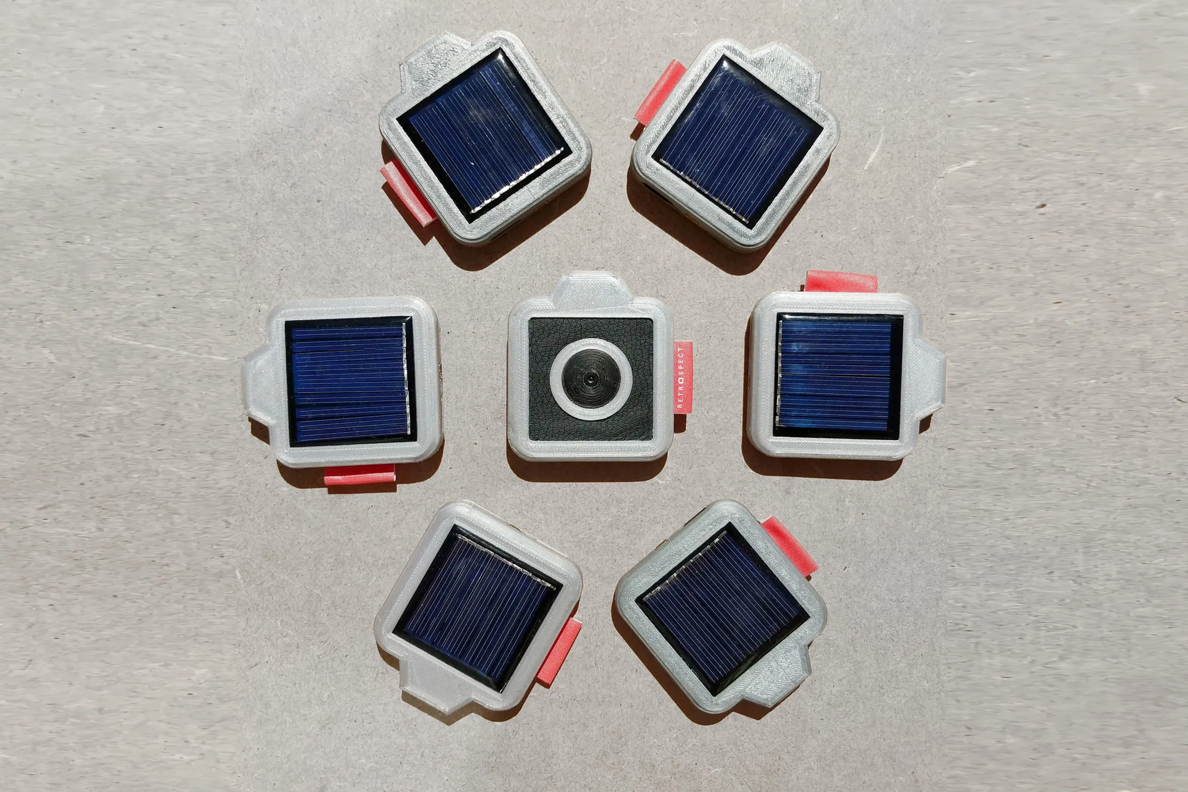 Six prototypes: five solar backs around one camera front